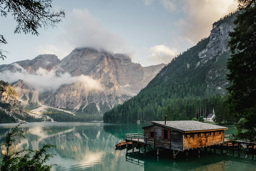 Misty green landscape reflected in a lake